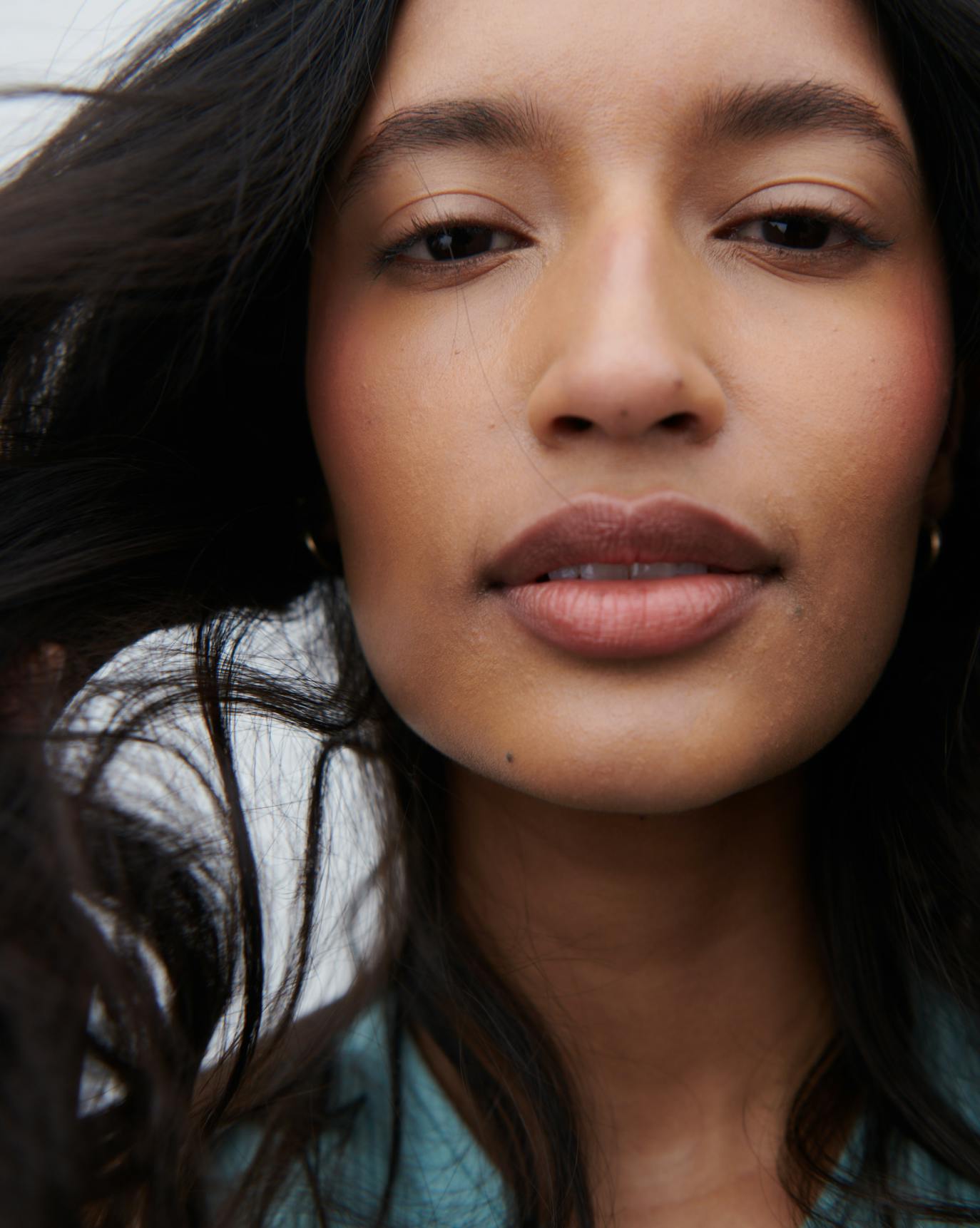 Thasfia in Stretch Fluid Foundation, MT1.
